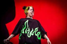 In true billie eilish style, the artist went with an oversized shirt and matching shorts for a performance, but this time, the graphics featured the initials of her name. Billie Eilish Billie Eilish S British Vogue Cover Shows More Than Just The Singer S Skin British Vogue