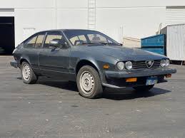 Image result for Light Silver 1985 Alfa-Romeo