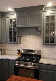 A Custom Range Hood Painted Gray To Match The Cabinets That Extend To The Ceiling T Kitchen Cabinets To Ceiling Kitchen Cabinet Crown Molding Kitchen Cabinets