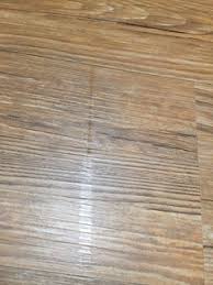We decided to us a plank vinyl flooring product for the entry at a fixer project. Allure Trafficmaster Warning