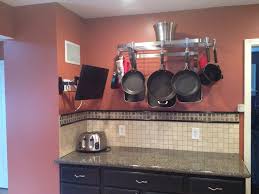 It gives a nice, clean finish and kept our edges we bought the tiles at the same time as the kitchen, and then my joiner installed the kitchen cabinets at the right height to fit the tiles without having to. When To Stop A Backsplash Home Improvement Stack Exchange