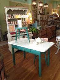The perfect place to show off a small picture frame, terrarium, or even a retro figurine, an accent shelf brings added dimension to your wall. 10 Repurposed Enamel Tabletop Ideas Vintage Kitchen Table Vintage Kitchen Vintage Table