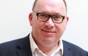 Who is Conservative peer Lord Andrew Cooper and why was he suspended?