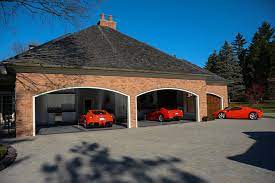 Unbiased car reviews and over a million opinions and photos from real people. Six Car Garage Doors Open View Contemporary Garage Detroit By Rembrandt Construction Houzz Uk