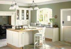 A mix of vintage brass handles, some from an old ship, keep the magpie vibe. 11 Green Kitchen Walls Ideas Green Kitchen Green Kitchen Walls Kitchen Design