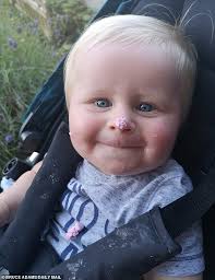 Baby boy was found dead in bed days after he was wrongly discharged from  hospital despite a high temperature, extreme heartrate and a sandpaper-like  rash, inquest told