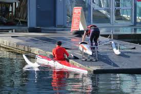 If you have a fiberglass or composite kayak that you might damage by sliding it across the sand, move it out until it's floating in a few inches of water. How To Get In And Out Of A Kayak Hone Your Essential Kayaking Skills