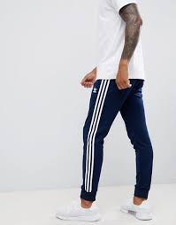 Adidas Originals Three Stripe Cuffed Sweatpants In Black Adidas Originals 3 Stripe Skinny Sweatpants With Cuffed Hem In Navy Dh5834 Modesens Pants Outfit Men Sneakers Men Fashion Reebok Retro