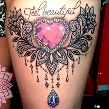 This lace tattoo design is elegant and unique, and the lotus in the center is a nice addition to the overall design. Dimonds Tattoo Dimonds Tattoo Chest Piece Idea Sternum Tattoo Jewel Buymediamond Com Ta Gem Tattoo Lace Tattoo