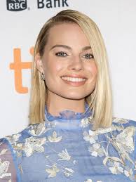 See Margot Robbie Channel Sharon Tate in Go-Go Boots for Once Upon a Time  in Hollywood