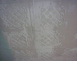 Clean the ceiling tile grid with a sponge and. Tin Ceiling Tile Look For Almost Free With Plaster And Paint Hometalk