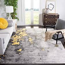 Calming grey tones down the strength of yellow and in return the uplifting, sunny shade gives grey a personality and strength it wouldn't have on its own. Amazon Com Safavieh Adirondack Collection Adr134h Modern Abstract Non Shedding Stain Resistant Living Room Bedroom Area Rug 8 X 10 Grey Yellow Furniture Decor