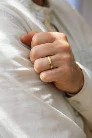 A thumb ring is also often the natural choice for men who want to wear multiple rings on the same hand, since it's at least somewhat distanced from the others. Unique Men S Wedding Band With Engraved Geometric Pattern Artemer