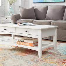 The bottom units each have a drawer for storage, while the upper ones are shelves. Stylewell Cedar Springs Rectangular White Wood 2 Drawer Coffee Table 42 In W X 18 11 In H Ct 1013 White The Home Depot