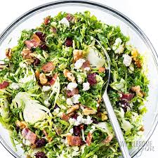 Cook the bacon in a large. Kale And Brussels Sprout Salad Recipe With Bacon Cranberries And Pecans Wholesome Yum