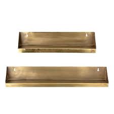 The simple design of the classic brass shelf brackets allows the shelf to be the focal point. Una Antique Brushed Brass Shelf Two Sizes 38cm Or 51cm Mink Interiors