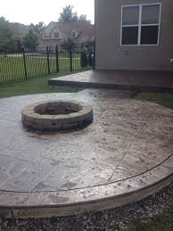 Shop for round gas fire pit online at target. A Beautifully Designed Colored Stamped Concrete Patio Using A Combination Of Earth Toned Colors With The Addition Fire Pit Area Fire Pit Landscaping Fire Pit
