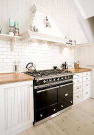 Upgrade your cooking to bosch appliances. Kitchens With Black Stoves And Ranges White Kitchen Ceiling Kitchen Inspirations Kitchen Ceiling
