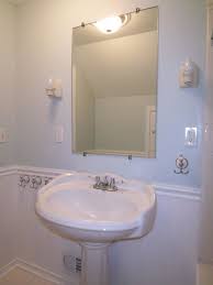 Wonderful Cottage Style Bathroom Light Fixtures Using White Ceramic Wall Sconce And Frameless Rectan Bathroom Wall Sconces Cottage Style Bathrooms Wall Sconces