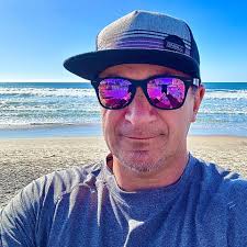 Is there a way to make apps use the full front screen and not cut off where  the camera is?