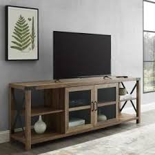 Welwick Designs 70 In Reclaimed Barnwood Composite Tv Stand Fits Tvs Up To 78 In With Storage Doors Hd8119 The Home Depot In 2020 Living Room Tv Stand Farmhouse Tv Stand Reclaimed Barn Wood