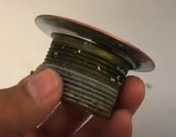 Disassemble the existing drain assembly so you can remove the strainer, which most now, the primary seal around a basket strainer is plumber's putty between the top flange of the strainer and the drain hole in your kitchen sink; How To Remove Bathroom Sink Drain Flange