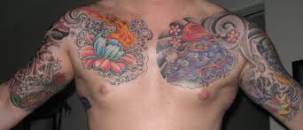 The earliest evidence of ornamental tattoo designs can be found in the roman empire, they were clearly visible in the form of leaf and floral patterns on wallpapers, carpets, and furniture. 21 Bold Flower Tattoos On Men Tattoo Me Now