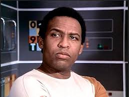 The late Paul Christensen assisting Clint Jones, replacing a power assembly 