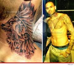 Chris brown's new tattoo looks like the face of a battered woman. Chris Brown New Neck Tattoo Photos