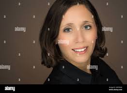 In this photo taken Dec. 4, 2014, Julie Pace poses for a photo in the  Washington Bureau. The Associated Press is naming White House Correspondent  Julie Pace as its new chief of