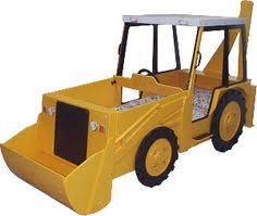 Diy construction digger bed the completed front loader looks just like the real thing and sports hubcaps, a shelf for soft toy passengers and a space to display for all their bedtime stories about trucks, building and excavating (of course!). 30 Digger Bed Ideas Kid Beds Bed Boys Bedding