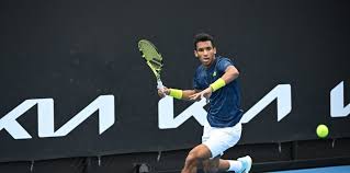 Felix auger aliassime beat his idol roger federer (image: Felix Auger Aliassime Flies Milos Raonic Recovers To Reach Third Round At Australian Open Tennis Canada