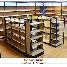 Wood racks design gondola shelf for boutique store display rack. Source Supermarket Racks Wall Wooden Shelves Convenience Store Supplies Display Furniture Gondo Store Shelves Design Grocery Store Design Store Design Interior