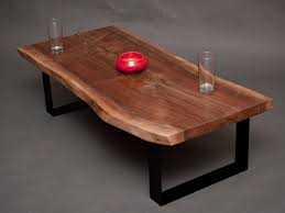 This coffee table called flap flap designed by francesco barberini and nina a has the form factor of a butterfly at the bottom which gives it a very distinctive look. Coffee Table Coffee Table Wood Living Room Coffee Table