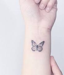A small butterfly tattoo (life sized or. Pin By Molly M On For Me Tattoos Tiny Tattoos Butterfly Wrist Tattoo