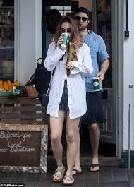 Suki Waterhouse joins beau Robert Pattinson for a romantic stroll