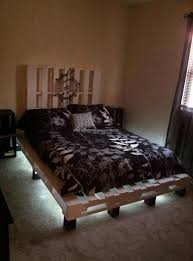 Lets Talk About A Bed That Is Repurposed With Pallet Wood And It Has Lights Underneath Pallet Bed With Lights Pallet Projects Furniture Bed Without Headboard Einfach full upholstered wingback platform bed frame with headboard/mattress foundation with wood slat support and square stitched headboard/no box spring needed/easy.