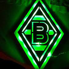 Als älteste schule am ort sowie eine der ältesten schulen in bergisch gladbach, kann die kgs bereits auf eine lange, durch veränderungen der schulsysteme geprägte schulgeschichte zurückblicken. Logo Raute Borussia Monchengladbach Mit Grunen Led Licht Illuminiert Vfl Borussia Monchengladbach Borussia Monchengladbach Vfl Borussia