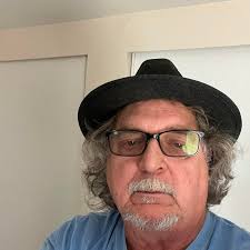 Deck and Step Framing Against Red Siding