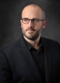 Bass trombone and wind ensemble version of Violent Shadows