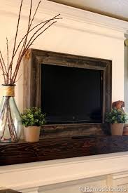 Remodelaholic Framing In A Wall Mount Television Rustic Picture Frames Framed Tv Home Diy