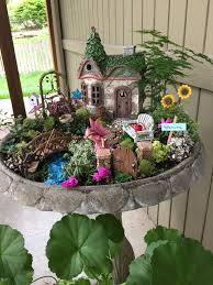 Fairy Garden This Was A Fun Project That My Granddaughter Really Enjoyed Helping With My Garden Your G Miniature Fairy Gardens My Fairy Garden Fairy Garden