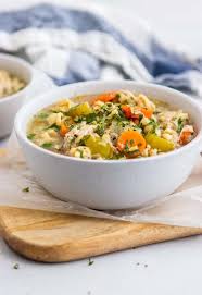 This recipe is solid winter slow cooker material! Easy Rotisserie Chicken Noodle Soup Stove Top Slow Cooker
