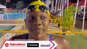 Adara Stoddard takes gold in the girls' 15 -17 category of the 200-metres  breast stroke. Stoddard won Barbados' first medal