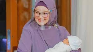 Born 11 january 1979) is a malaysian singer, songwriter, actress and businesswoman with more than 300 local and international awards. Malaysian Singer Siti Nurhaliza And Husband Fined Rm20 000 For Baby S Ceremony Which Breached Covid 19 Protocols Cna