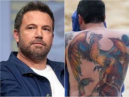 Ben affleck shows off his massive phoenix back tattoo while going shirtless on the beach in hawaii over the weekend. Ben Affleck Defends Huge Back Tattoo Says It S Meaningful To Him