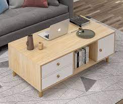 The drawer occupies the whole body of the table; Deluxe Coffee Table With Drawer
