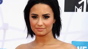 Demi Lovato Says She was 'Very Conflicted' With Her Abusive Father's Death 