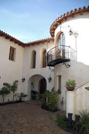 Material selections, layout patterns, and accent details all play a part in the continuation of the home's design vocabulary and character. Front Exterior Spanish Architecture Spanish Colonial Architecture Spanish Style Mexican Architecture Spanish Style Homes Spanish Style Decor Spanish Style
