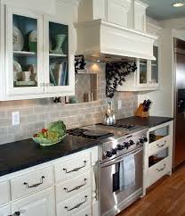 Image Result For Cream Cabinets Black Countertops Greige Wall Replacing Kitchen Countertops Greige Kitchen Kitchen Remodel